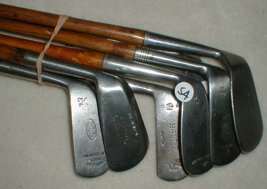 Gifts for the Golfer! Golf Gifts. Wooden Shaft Golf Clubs and Collectibles, Antique Golf Balls and golf collectables. Hickory Golf Clubs - Great artifacts for interior decorating! Rare coins on ebay. Gofl clubs.